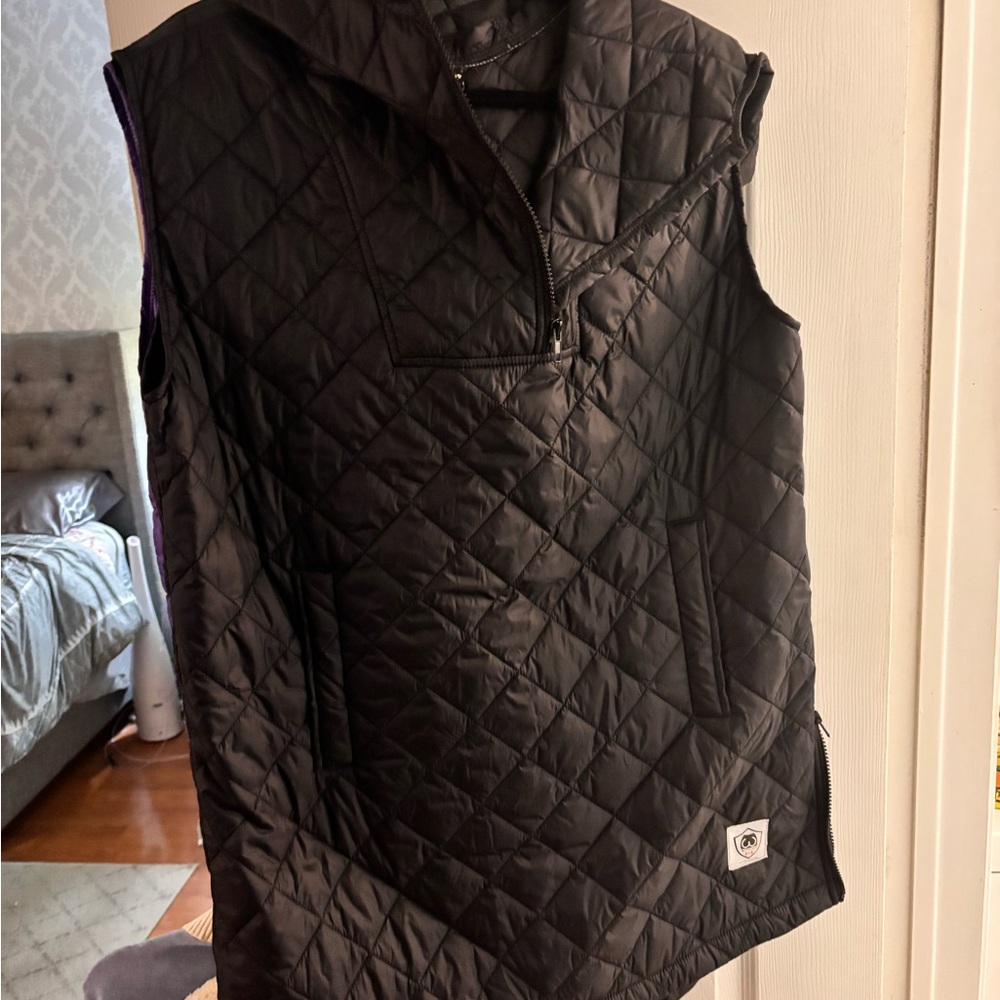 Quilted vest.  Buttcoat Canada